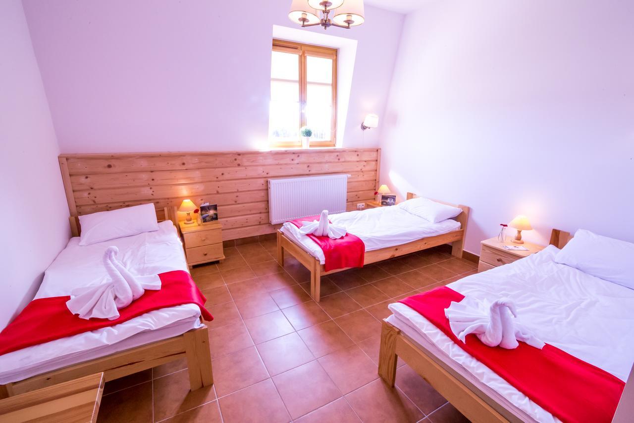 Hotel Kurpiowska Kraina à Wydmusy Extérieur photo