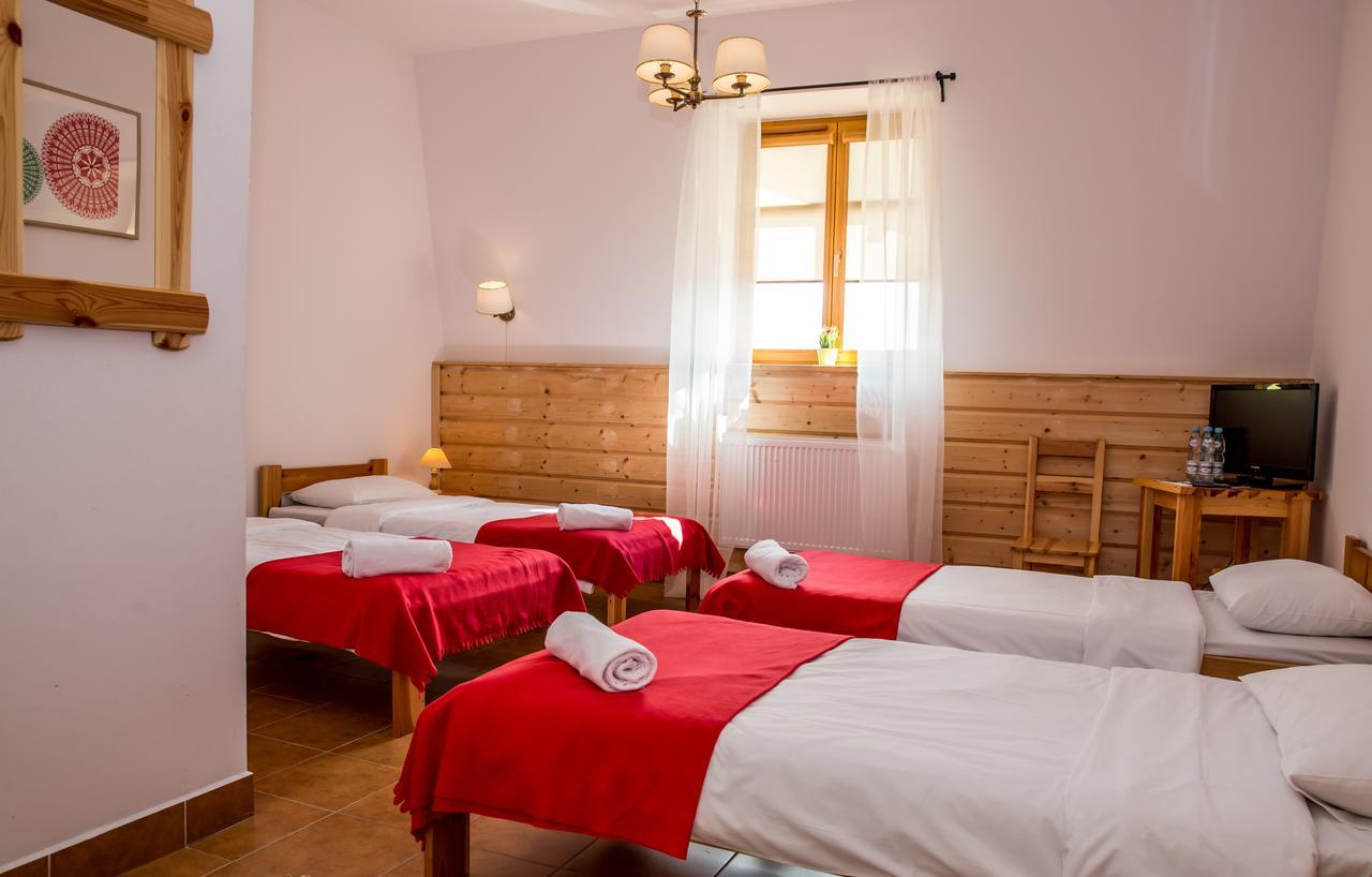 Hotel Kurpiowska Kraina à Wydmusy Extérieur photo