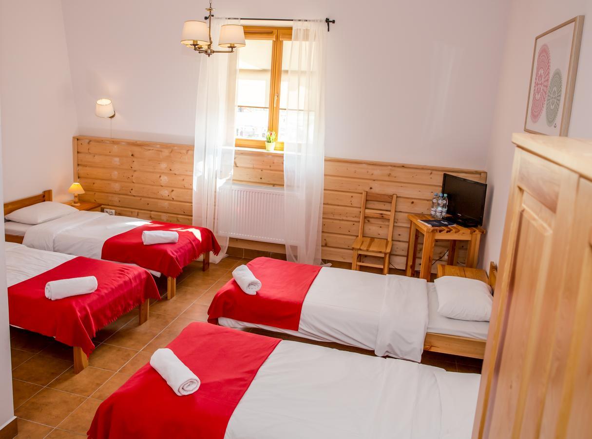 Hotel Kurpiowska Kraina à Wydmusy Extérieur photo