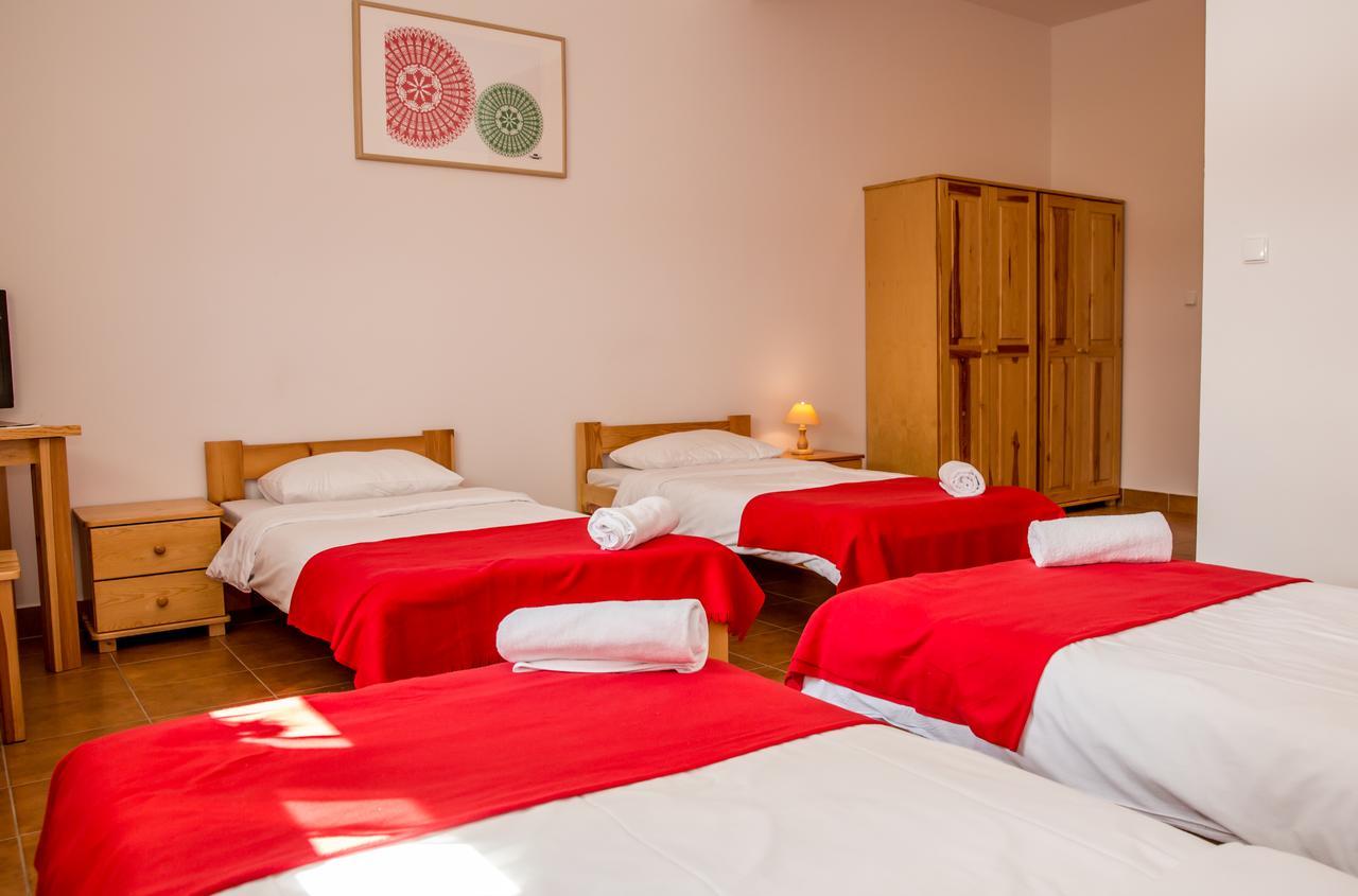Hotel Kurpiowska Kraina à Wydmusy Extérieur photo