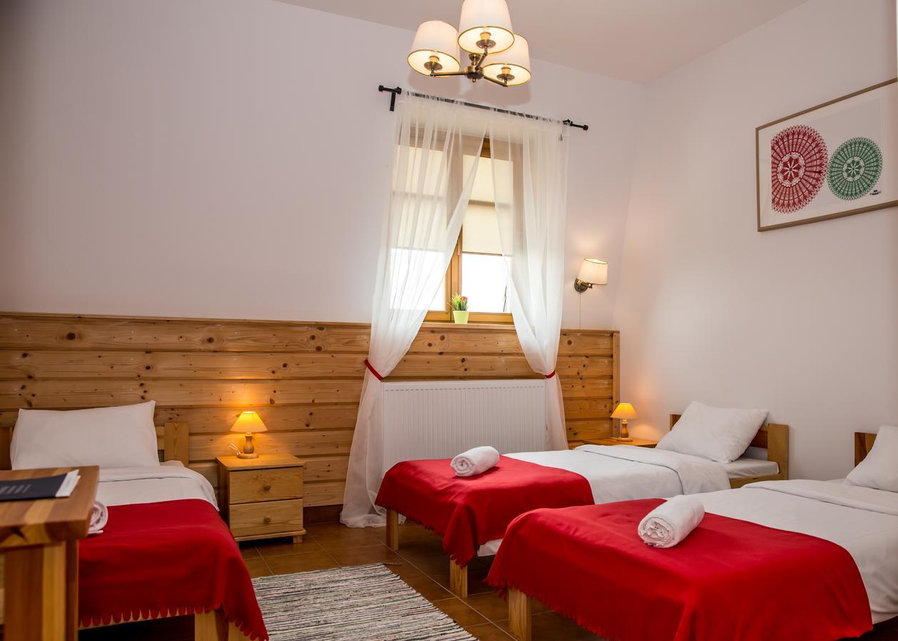 Hotel Kurpiowska Kraina à Wydmusy Extérieur photo