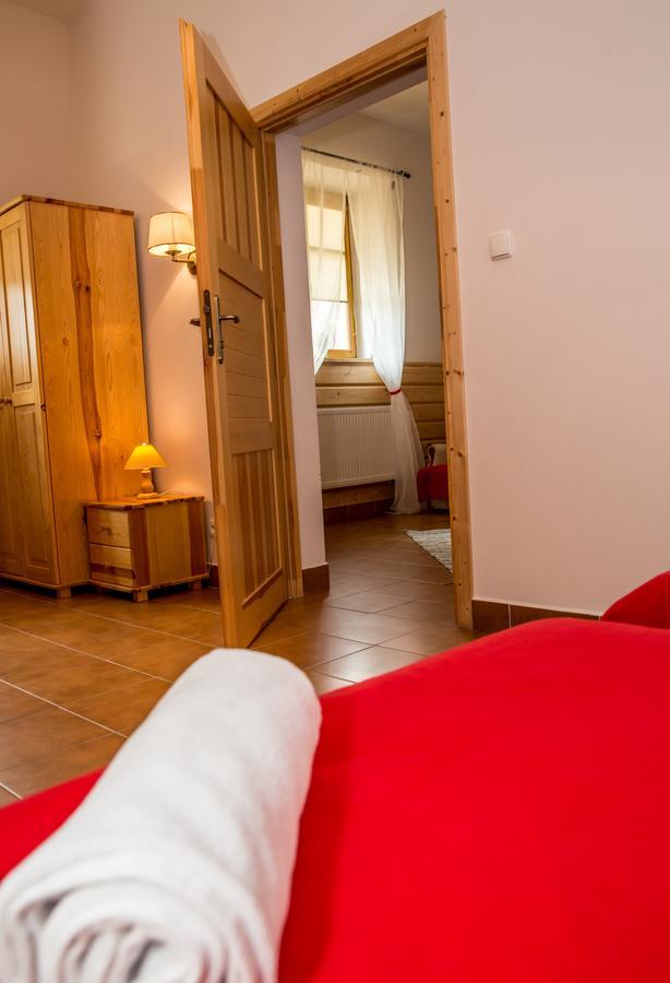 Hotel Kurpiowska Kraina à Wydmusy Extérieur photo