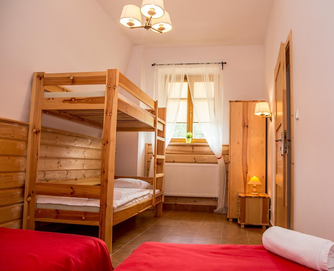 Hotel Kurpiowska Kraina à Wydmusy Extérieur photo